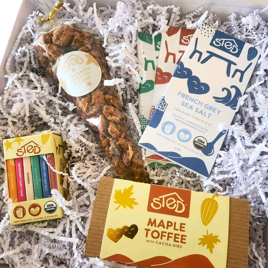 Sted Foods Deluxe Chocolate Gift Box — premium assortment with handcrafted bars, maple toffee, and candied pecans.